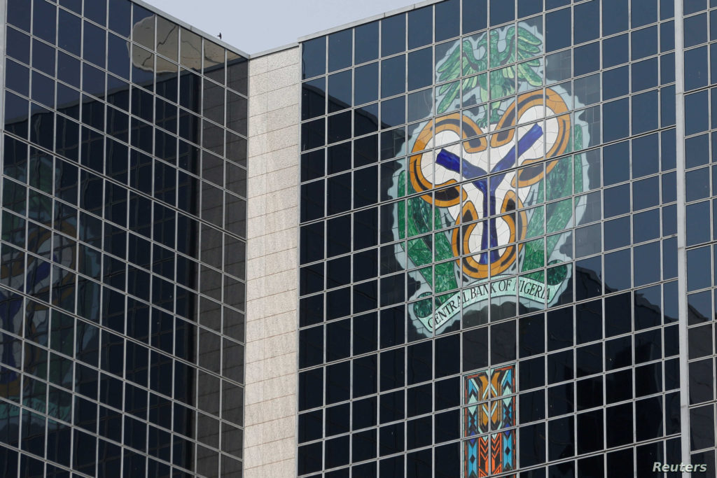 Central Bank of Nigeria's logo is seen on the headquarters building in Abuja